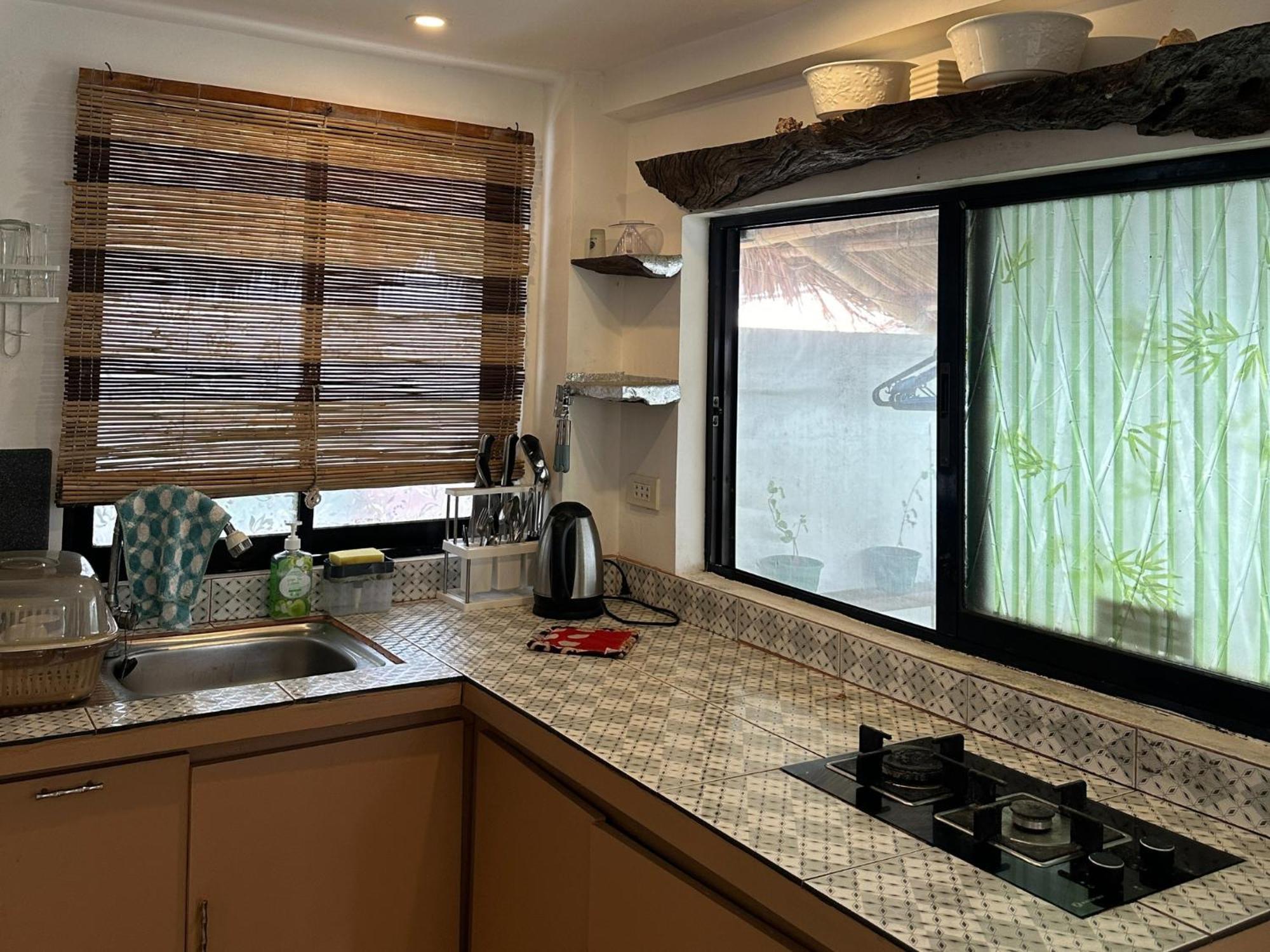 Niu Ohana East Bay Apartments Balabag  Buitenkant foto